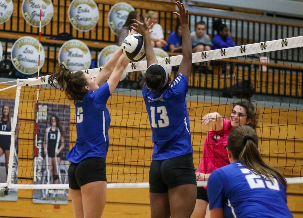 Volleyball: Royals overcome Millers in four tight sets