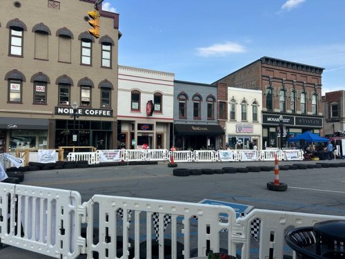 Bed-Race-2025_racetrack with businesses