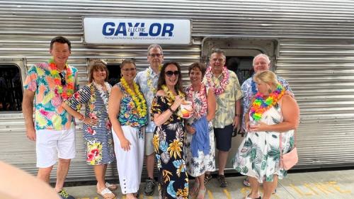 Group with Lily in front of Gaylor car