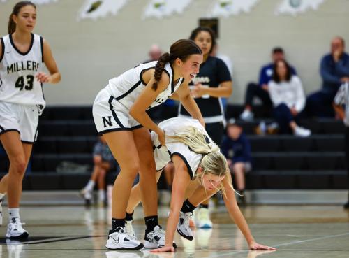 Noblesville-bball-Reagan-Wilson-helps-Kate-Rollins